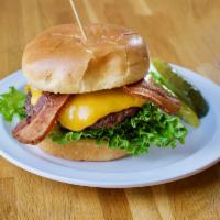 Bacon Cheeseburger · 1/2 lb. black Angus beef with Wisconsin aged cheddar, smoked bacon, leaf lettuce, sliced tom...