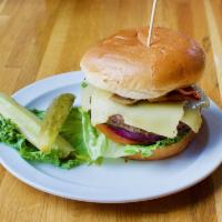 District Shrooms Burger · 1/2 lb. black Angus burger with smoked Virginia ham, grilled mushrooms, Swiss cheese, leaf l...