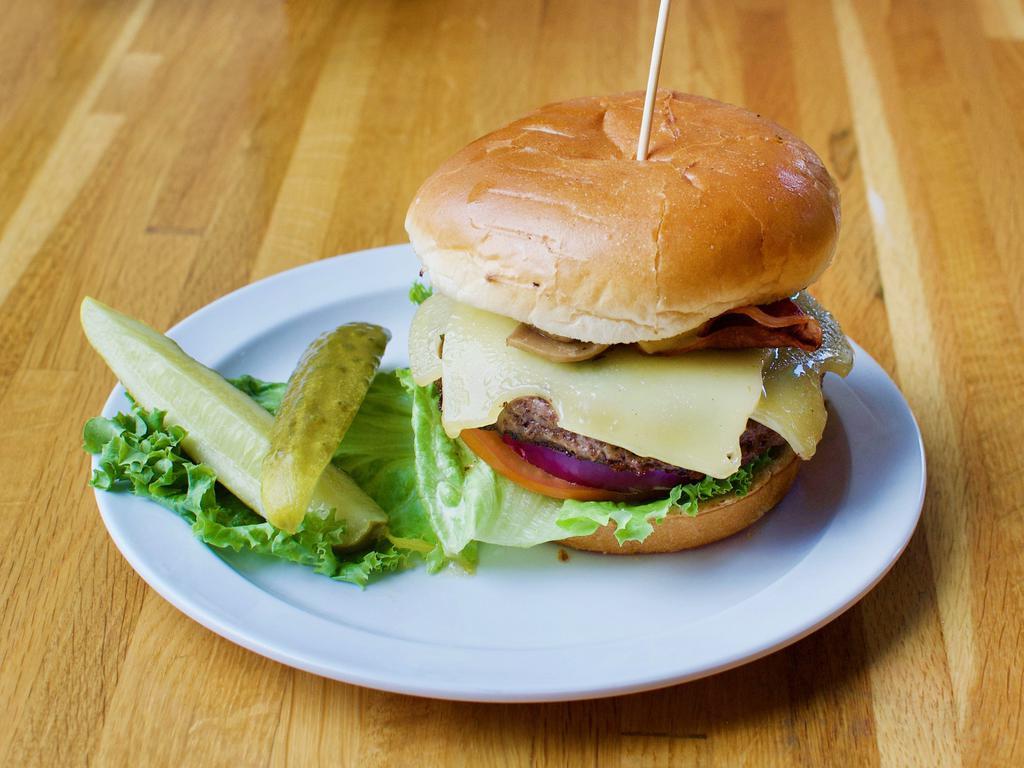 District Shrooms Burger · 1/2 lb. black Angus burger with smoked Virginia ham, grilled mushrooms, Swiss cheese, leaf lettuce, sliced tomatoes, sweet red onions and Dijon mustard. Add fries for an additional charge.


*Consuming raw or undercooked meat, burgers may increase your risk of foodborne illness.
