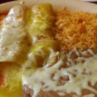 Enchiladas Jalisco · Three carne asada enchiladas with your choice of red or green salsa, then topped with queso ...