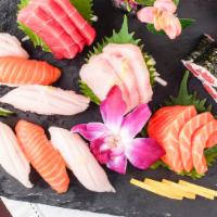 Sushi & Sashimi Combination · 6 pieces of sushi 9 pieces of sashimi and 1 tuna roll.