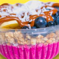 Sweet Dragon Pitaya Bowl · Our tasty homemade Pitaya base topped with granola, banana, blueberry, coconut flakes, and N...