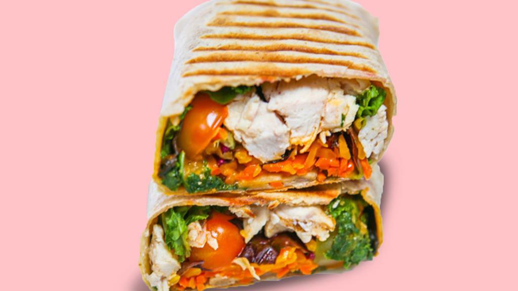 The Buffalo Wrap · Grilled chicken, tomatoes, carrots, cheddar cheese, with Spicy Buffalo in a flour tortilla