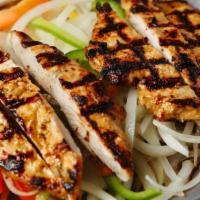 Chicken Fajita · Chicken fajitas over sautéed green peppers and Spanish-style onions. Served with Mexican ric...