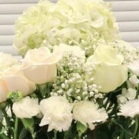 White Wonderland  · White wonderland bouquet comes with vase.