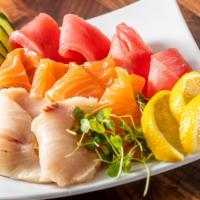 Sashimi Combo #3 · Rainbow rainbow, four pieces of chef choice nigiri and nine pieces of chef choice sashimi.