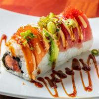 Rainbow Roll Special · In: premium crab salad, avocado, cucumber. Out: tuna, salmon, yellowtail and avocado.