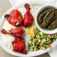Chicken Tandoori · Chicken leg and thigh marinated in yogurt, spices and grilled until tender and juicy.