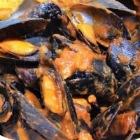 Mussels Marinara · 1 LB. of mussels cooked in Marinara, side salad and garlic bread