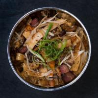 Gf Brisket & Rice Cakes · Smoked brisket, bean sprouts, carrots, shiitake mushrooms.