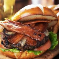 Cowboy Bbq Burger · All beef burger topped with Cheddar Cheese, Hickory BBQ sauce, Cherrywood smoked bacon, Cris...