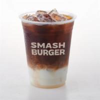 Vanilla Cold Brew Latte · Handcrafted Cold Brew Coffee, Whole Milk and Vanilla Served Over Ice