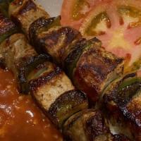 Shish Kabob (Souvlaki) · One skewer of pork tenderloin with onions and peppers served with rice or potatoes.