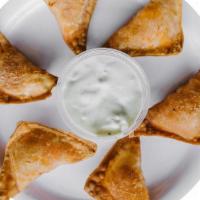 Buffalo Poppers · Crispy Wontons | Grilled Buffalo Chicken | Pepper Jack Cheese. Suggested Dressing: Bleu Chee...