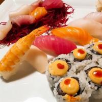 Sushi Sashimi Combo · Spicy tuna roll, 6pcs nigiri, 6pcs sashimi of chef's choice.

Consumer - warning consuming r...