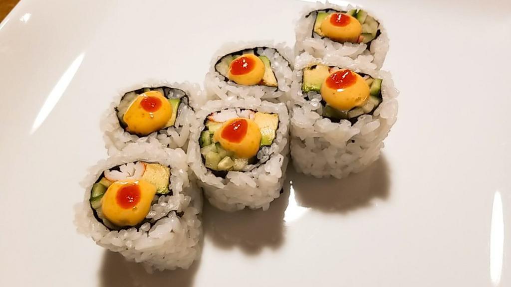 Spicy California Roll · Crab Salad, Avocado and Spicy mayo on top.