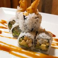 Philly Cheese Roll · Crab, avocado, cucumber, shrimp tempura, cream cheese with eel sauce on top.