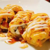 Sunday Morning Roll · Salmon and cream cheese with whole roll deep fried and yum yum sauce on top.

Consumer - war...