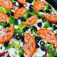 Garden Veggie Pizza · Mushrooms, black olives, green peppers and onions.