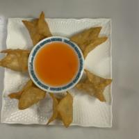 Crab Rangoon (6) · Crab and cream cheese filled in fried shell.