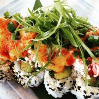 Southwest Detroit Roll · Spicy tuna, avocado, cilantro, and jalapeno inside. Topped with krab mix, spicy mayo, Valent...