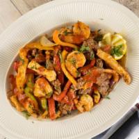 Fajitas Full Order Shrimp,Skirt Steak,Chicken · Sautéed bell peppers,onion,tomate,cillanto,special sauce,served with 16 oz rice,16 oz beans,...
