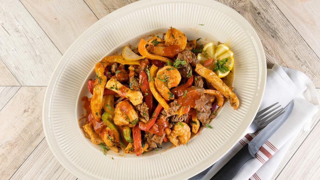 Fajitas Full Order Shrimp,Skirt Steak,Chicken · Sautéed bell peppers,onion,tomate,cillanto,special sauce,served with 16 oz rice,16 oz beans,8 oz guacamole, flour or corn tortilla. (If you add additional items in the special instructions, there will be an up charge)