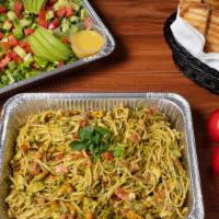 Pesto Linguine With Chicken · Linguine with Grilled Chicken, Artichoke Hearts, Homemade Pesto, Cream, Chopped Tomatoes, an...