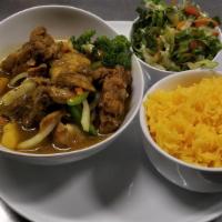 Curry Chicken · Serve with your choice of yellow rice or red beans and rice and steamed vegetables or our si...