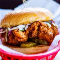 G. Chicken Sandwich · All-Natural Breast, topped with Coleslaw, Bread-N-Butter Pickles, and Duke's Mayo