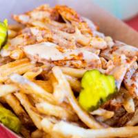 Qp Dirty Fries · Nice Crispy fries topped off with White Queso Cheese, Shredded Hot Chicken and pickles.