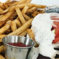 Gyro Pita · Seasoned lamb and beef with tomato, onion. and our signature tzatziki. Served with hand-cut ...
