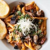 Creamy Spinach & Portabella Pasta · Spinach, portobello mushrooms, and grilled sausage tossed in a roasted tomato cream sauce an...