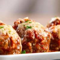 Meatball Parmigiana · With marinara sauce, meatballs and parmesan cheese.