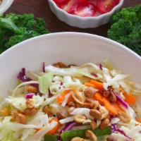 Crunchy Asian Salad (Vegan) · Napa cabbage, cabbage red and white snow peas. Scallions, carrots, baby kale,cilantro, bell ...