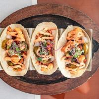 Spicy Caulifornia Tacos (Vegan) · Soft masa tacos filled With chickpeas batter, jalapenos, pickled onions and chipotle mayo. (...