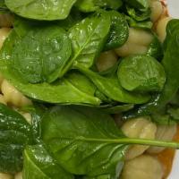 Spinach Gnocchi · Sage buttered gnocchi over a creamy butternut squash purée topped with fresh spinach and gre...