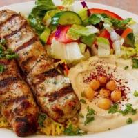 Chicken Kofta Kabob · 2 skewers, served with rice, hummus, salad or soup and pita bread.
