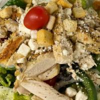 Greek Chicken Salad · Covered with grilled chicken, lettuce, tomato, cucumber, green pepper, onions, olives, feta ...