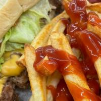 Sunnyside Cheesesteak & Fries · chopped steak mixed with onions and green peppers topped w/ lettuce, tomato, mayo, mustard, ...