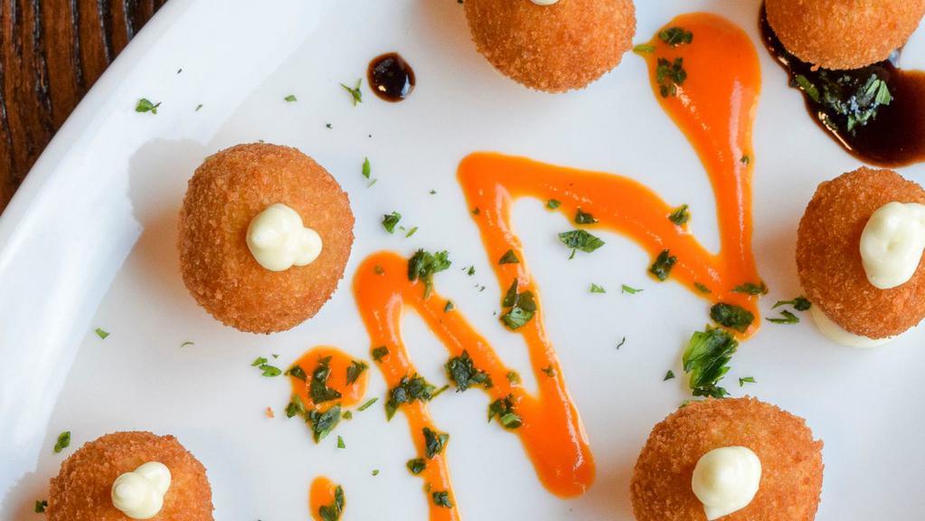 Cheese Croquettes · Goat, Parmesan cheese, blue cheese, green and red peppers.