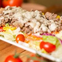 Cheese Steak Salad · Your choice of cheesesteak or chicken cheesesteak over fresh garden salad.