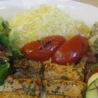 Sorrento'S Salmon Kabob Platter · Served with mixed green salad, salad Shirazi, saffron basmati rice and grilled vegetables an...