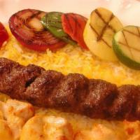 Chicken And Kubideh Kabob · One skewer of chicken breast and a skewer of ground sirloin. Served with grilled vegetables ...