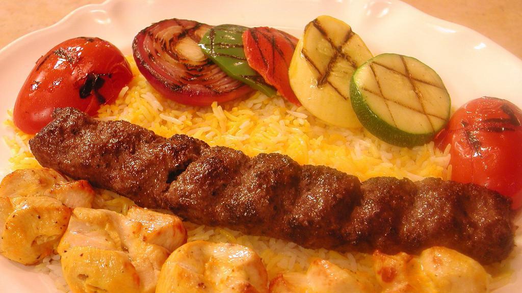 Chicken And Kubideh Kabob · One skewer of chicken breast and a skewer of ground sirloin. Served with grilled vegetables and tomato on a bed of bread or low carb (bed of lettuce) or with saffron basmati rice.