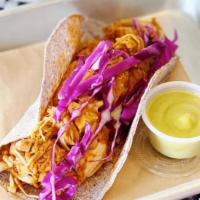 Revolucion Street Taco · Made with our housemade jackfruit “meat” simmered in Pibil Sauce on blue corn tortilla . Rev...