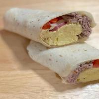 The Cove Burrito · Two eggs, sliced London broil, jack cheese, Tabasco, tomato and onion