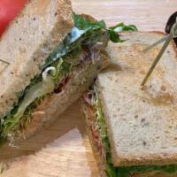 Tuna T' N T' · Our freshly made tuna salad on toasted rye with lettuce, sprouts, tomato and onion plus a ge...