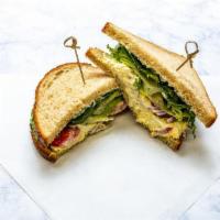 1/2 Egg Salad Sandwich · Freshly made old fashion egg salad with lettuce, tomato and onion on whole wheat bread with ...