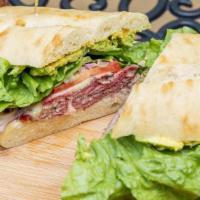 Pastrami Melt · Thinly sliced piping hot pastrami with. melted Swiss cheese, avocado slices,. ranch dressing...